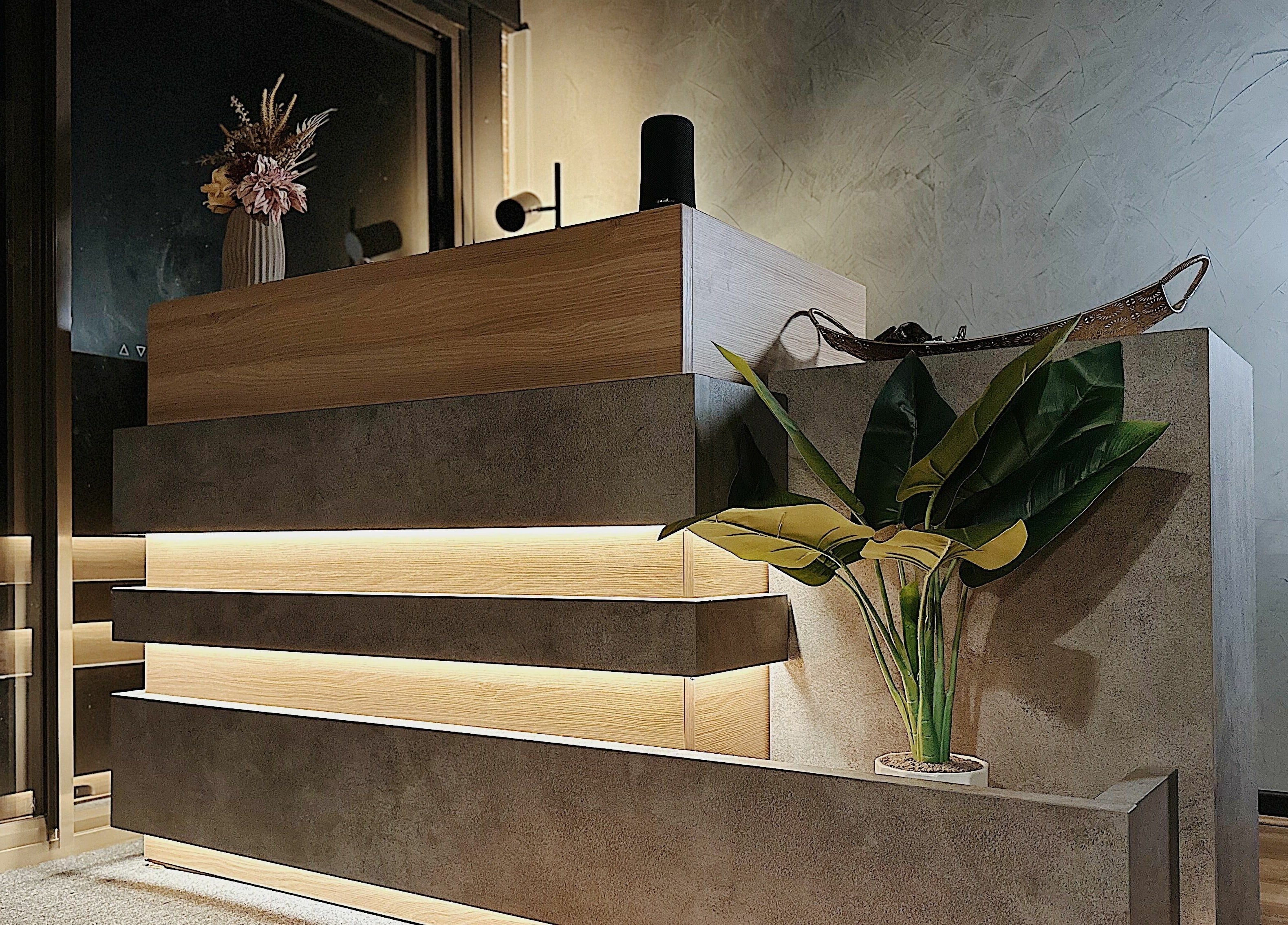Elegant reception area at Elly’s Studio, Melbourne, Victoria, AU, showcasing modern design and ambient lighting.