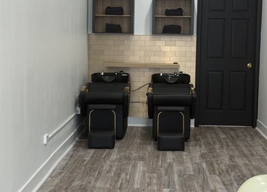 Chic hair wash stations at N’Luxe Beauty Lounge, Chicago, Illinois, US, showcasing modern interior design.