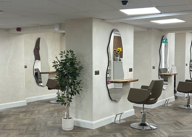 Stylish interior of Jennifer Holmes Hair and Beauty Ltd in Masham, England, GB showcasing elegant salon spaces.