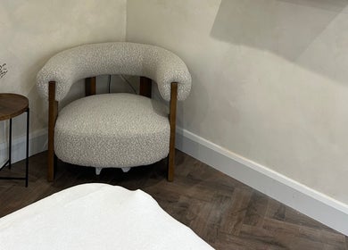 Elegant lounge chair at Jennifer Holmes Hair and Beauty Ltd, Masham, England, GB offering a serene, stylish ambiance.