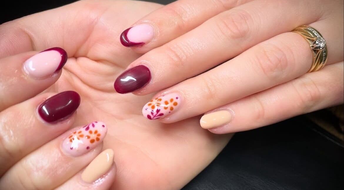 Beautiful floral nail art at House of Wax, Wrexham, Wales, GB, showcasing intricate designs and vibrant colors.