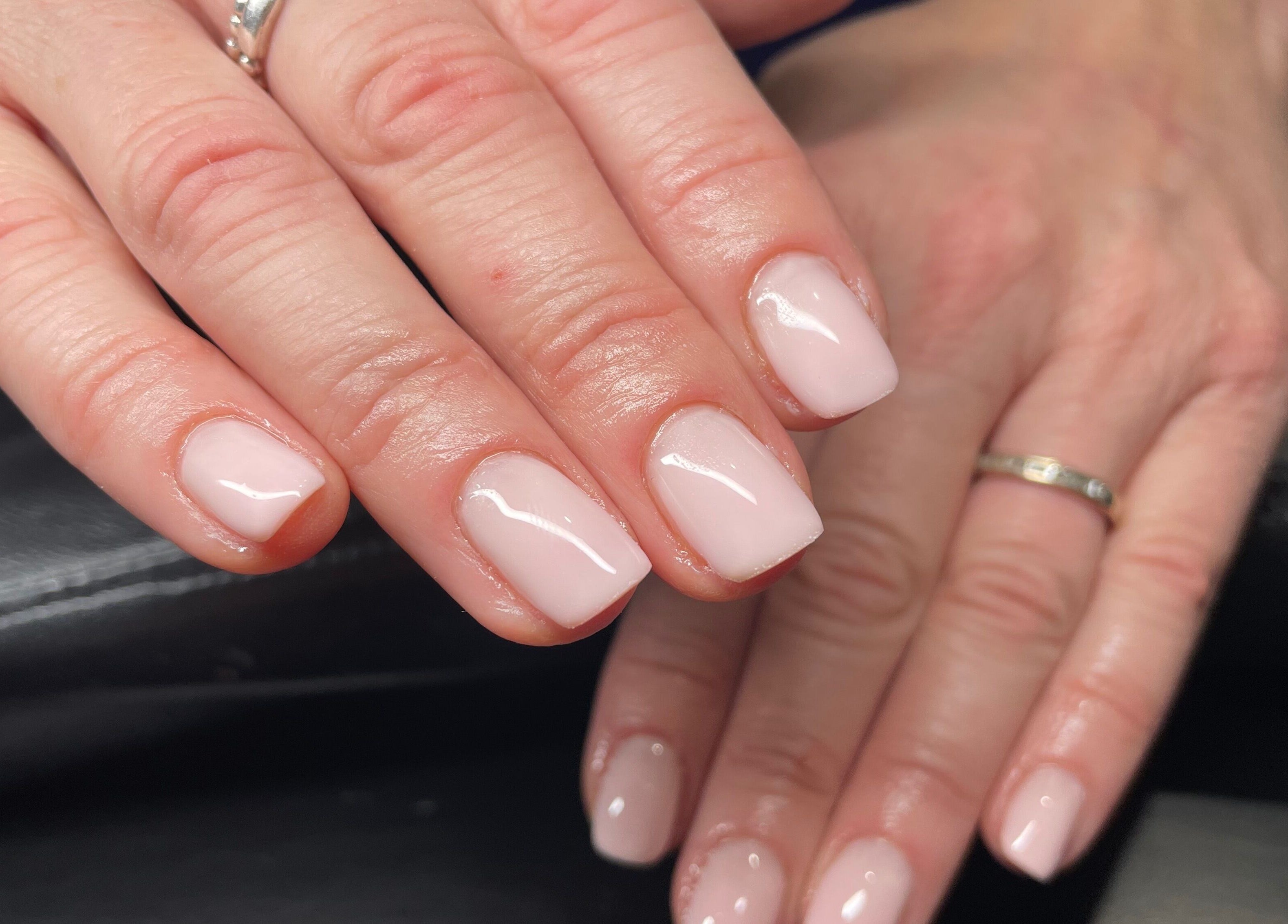 Elegant manicure at House of Wax, Wrexham, Wales, GB showcasing polished nails.