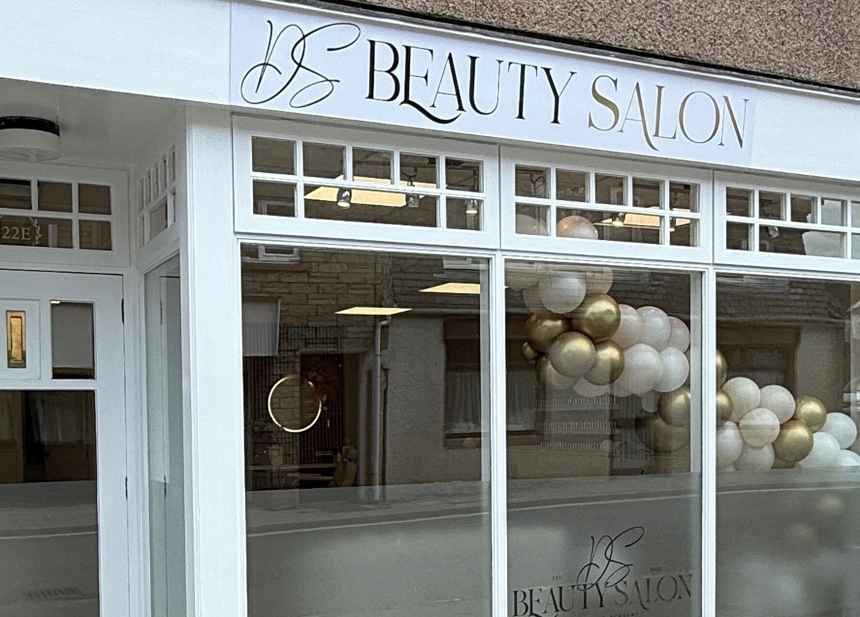 Front of DS Beauty Salon in Banchory, Scotland, GB with stylish signage and decorative balloons.