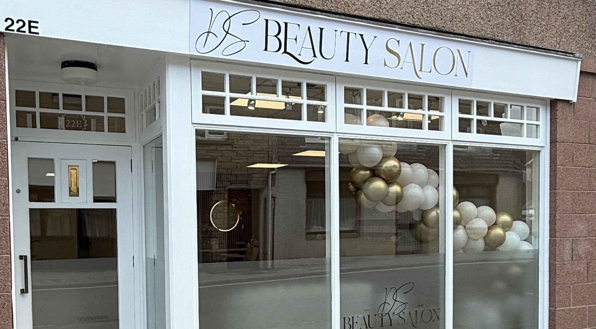 Front of DS Beauty Salon in Banchory, Scotland, GB with stylish signage and decorative balloons.