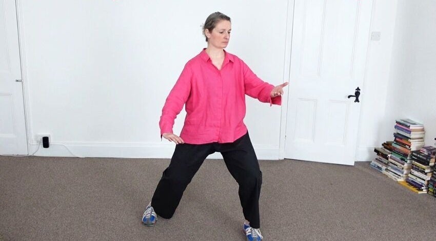 Instructor performing Tai Chi at Earth Balance Tai Chi, via Zoom/MS Teams, England, GB.