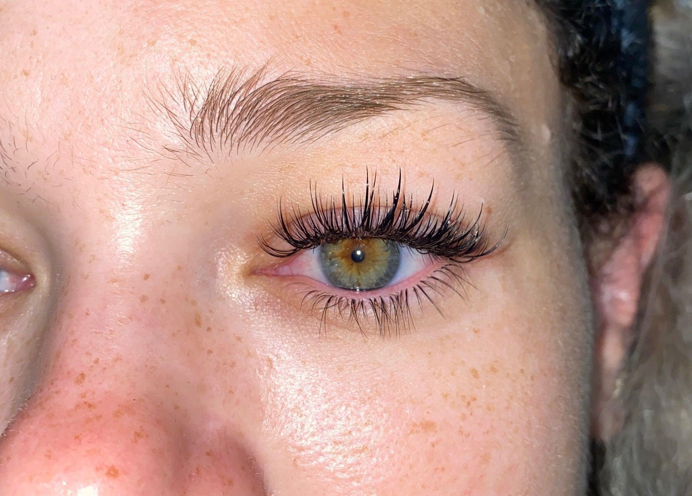 Close-up of eyelash extensions from MIA Beauty & Academy, Thành phố Hồ Chí Minh, VN showcasing expert styling.