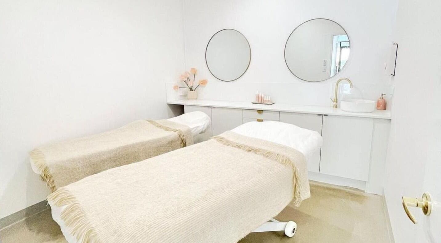 Calming treatment room at Rejuv Skin Clinic, Forster, New South Wales, AU with twin massage beds and soft decor.