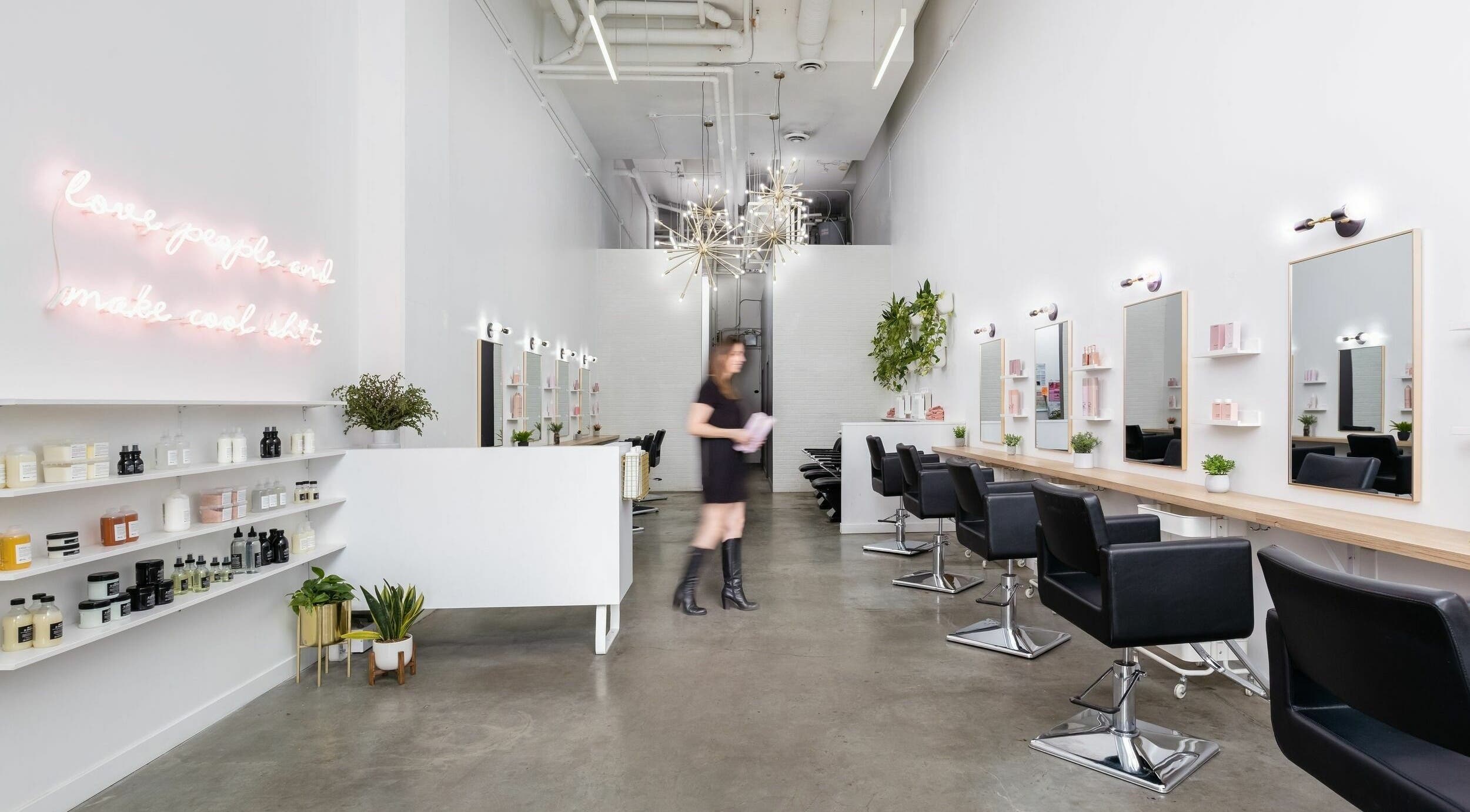 Modern salon interior at Sazz at Artel Salon in Vancouver, British Columbia, CA with stylish decor and seating.