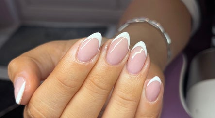 French manicure by Nails By Molly in Maxey, England, GB showcases glossy, white-tipped nails.