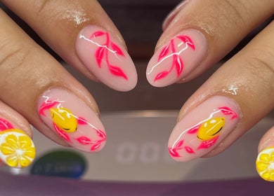 Vibrant citrus nail art by Nails By Molly in Maxey, England, GB. Bright lemon designs add a fresh touch.