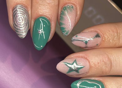 Green and pink star-themed nail art at Nails By Molly, Maxey, England, GB.