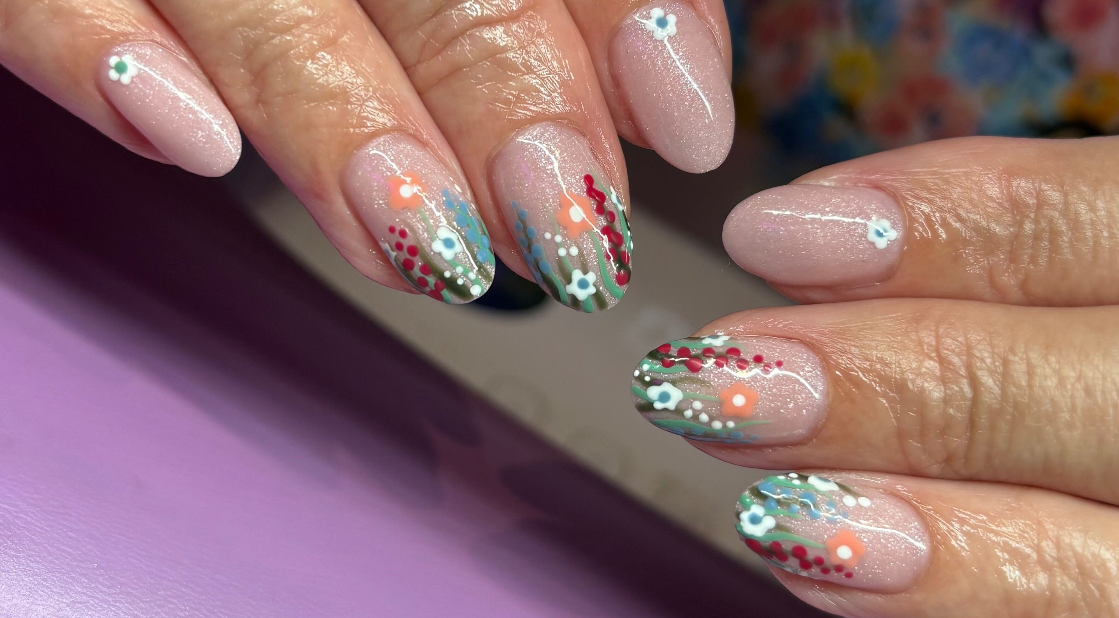 Floral nail art by Nails By Molly in Maxey, England, GB, featuring intricate flower designs on pink nails.