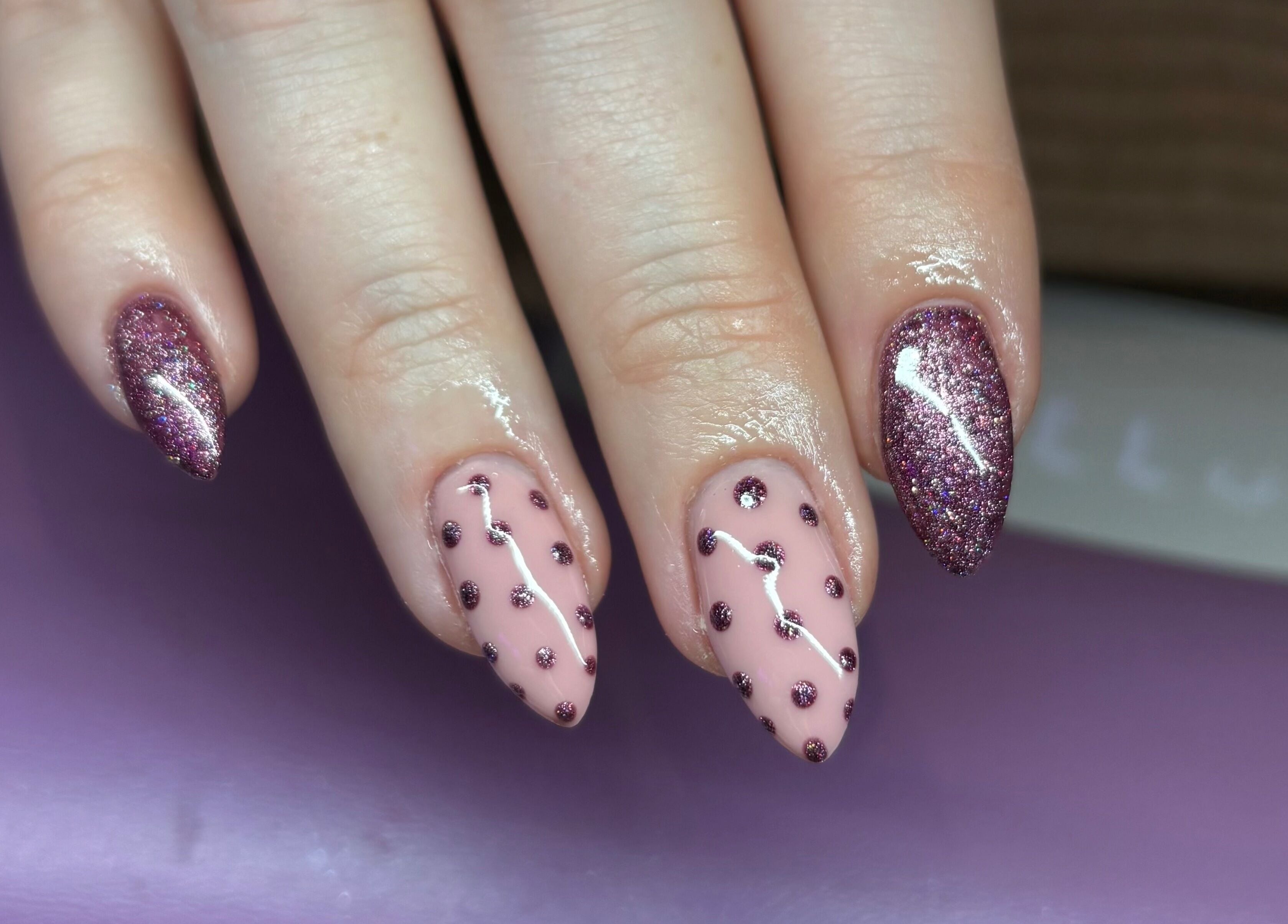 Close-up of glittery polka dot nails by Nails By Molly in Maxey, England, GB, showcasing exquisite nail art.