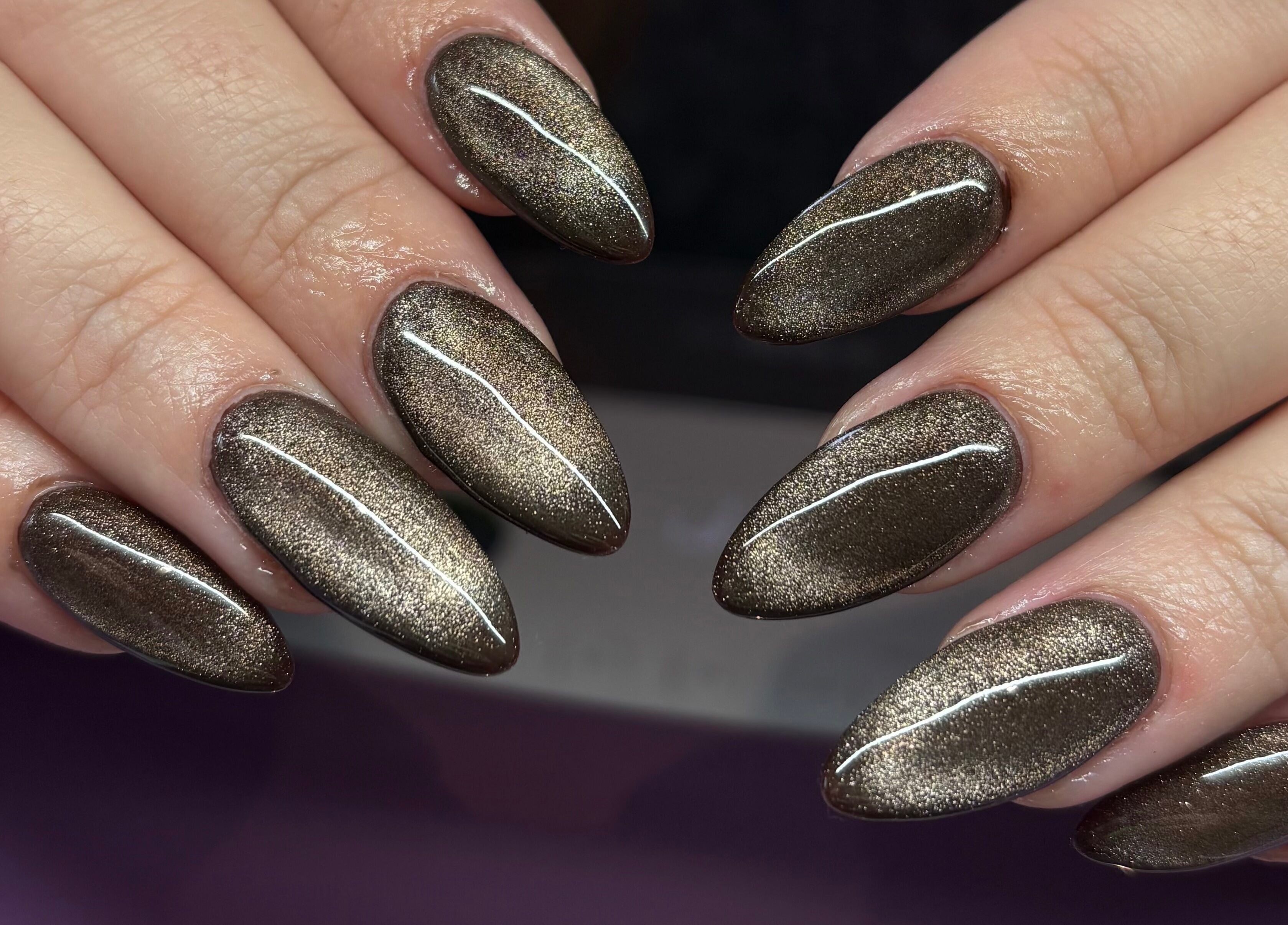 Elegant brown polished nails from Nails By Molly in Maxey, England, GB showcasing exquisite manicure art.