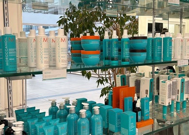 Premier Hair Centre's Moroccanoil products on display in Toronto, Ontario, CA salon featuring a stylish setup.