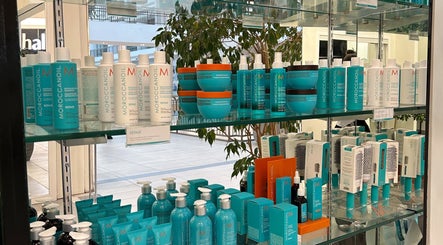 Premier Hair Centre's Moroccanoil products on display in Toronto, Ontario, CA salon featuring a stylish setup.