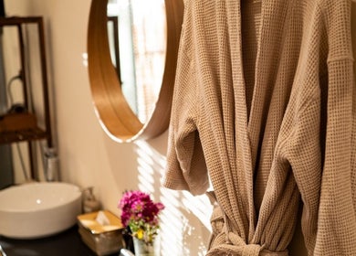 Relaxation robe at Warin Spa วารินสปา, Chang Wat Tak, Chang Wat Tak, TH, beside elegant vanity.