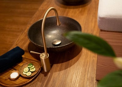 Elegant spa setting at Warin Spa วารินสปา, Chang Wat Tak, featuring a bowl, tap, and serene decor.
