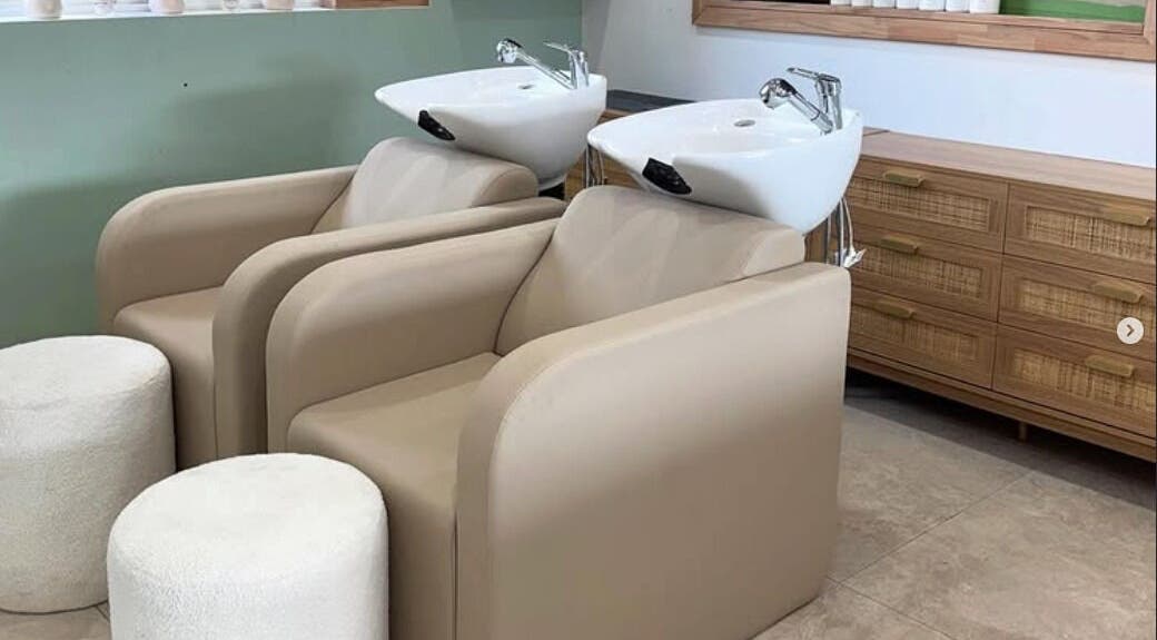 Modern wash stations at Ginger & Thyme Hair Co. in Armidale, New South Wales, AU, showcasing sleek design and comfort.