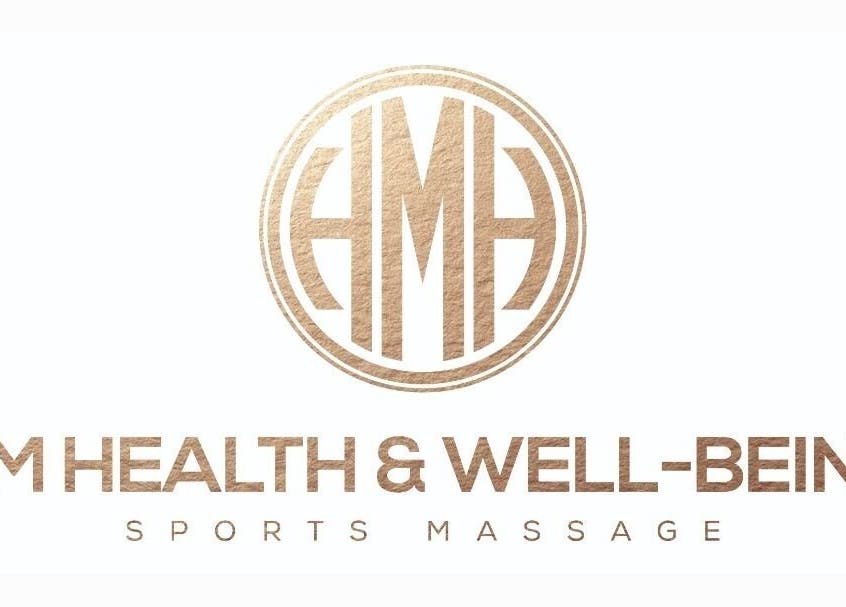 Elegant HM Health and Well-Being logo in Ashington, England, GB on white background.
