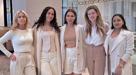 Team of women at Queen Brows and Skin, Melbourne, Victoria, AU, showcasing professional elegance.