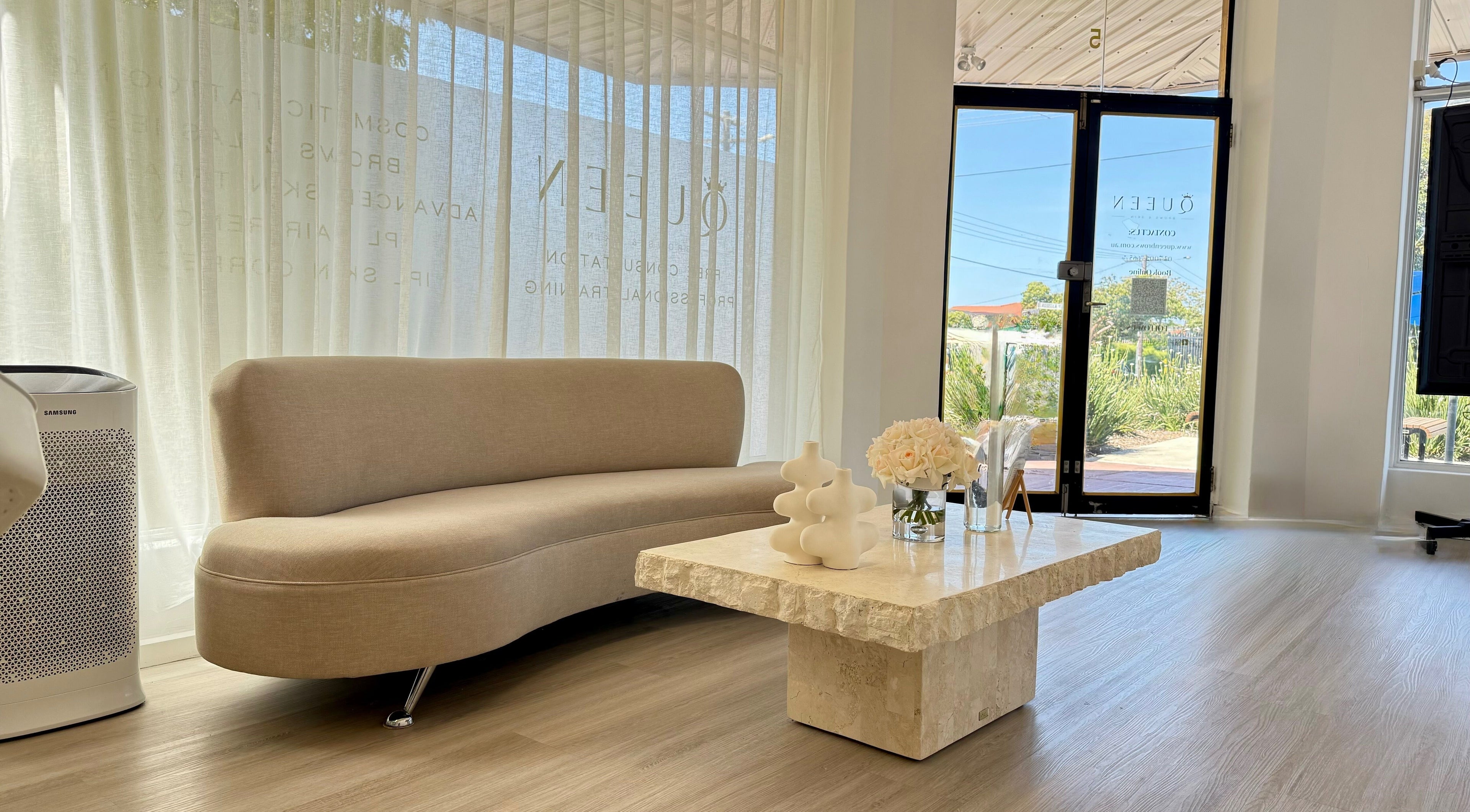 Relaxing lounge area at Queen Brows and Skin - Doncaster East, Melbourne, Victoria, AU.