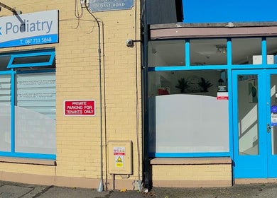 Front view of Blackrock Podiatry Clinic at Dundalk, County Louth, IE with blue signage and doors.