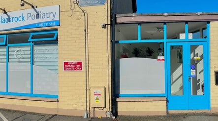 Front view of Blackrock Podiatry Clinic at Dundalk, County Louth, IE with blue signage and doors.