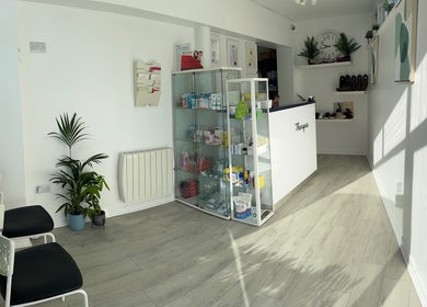 Bright reception at Blackrock Podiatry Clinic, Dundalk, County Louth, IE, showcasing modern decor and products.