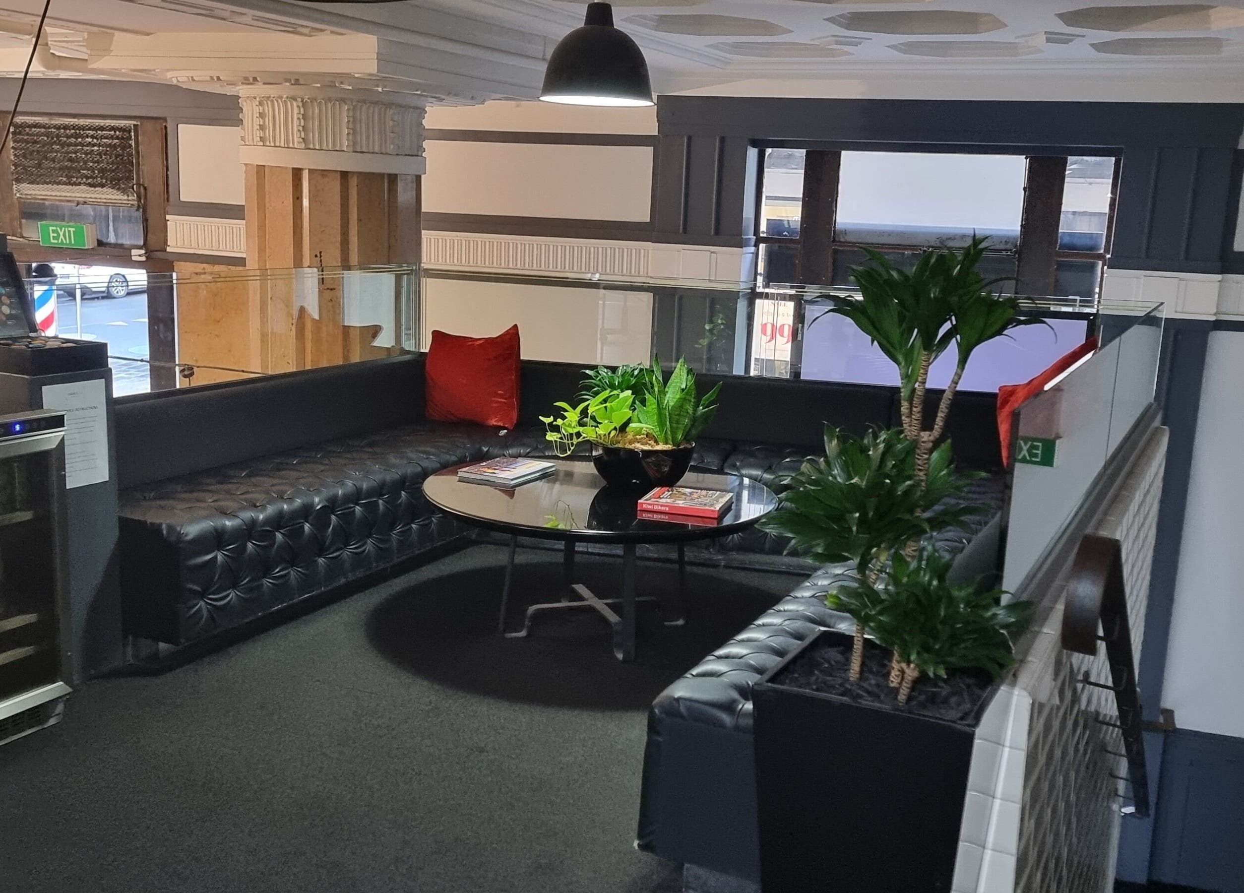 Elegant waiting area at Hava & Co, Auckland, NZ, featuring plush seating and modern decor.