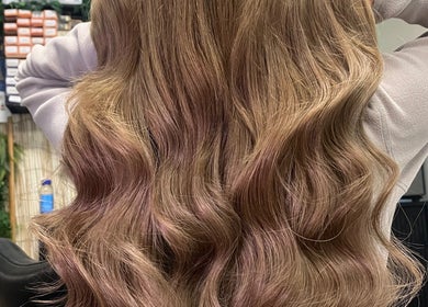 Flowing wavy hair styled at KG Hair in Newport, Wales, GB, showcasing salon's expertise in hair styling.