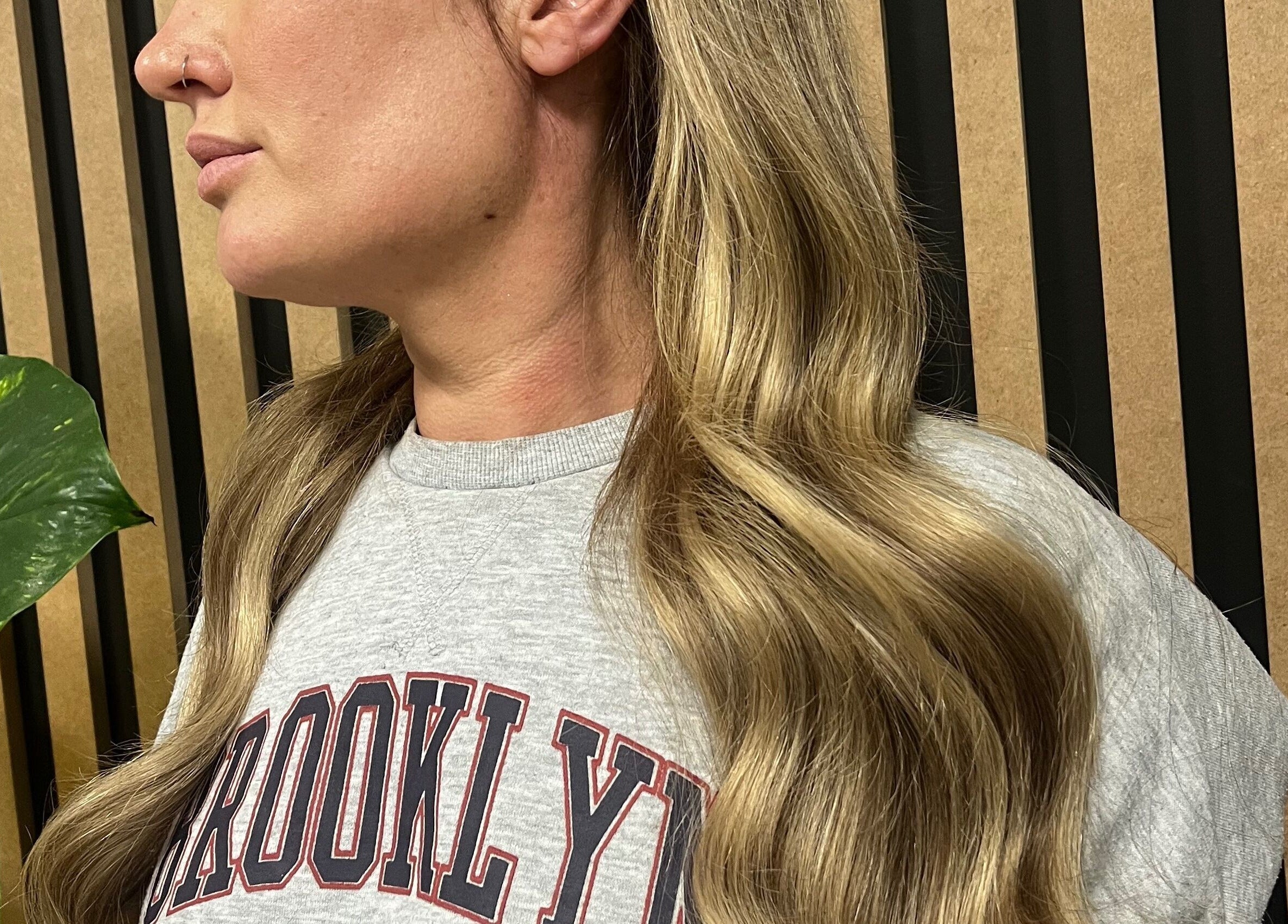 Wavy blonde hair styled at KG Hair, Newport, Wales, GB. Elegant and refined salon look.