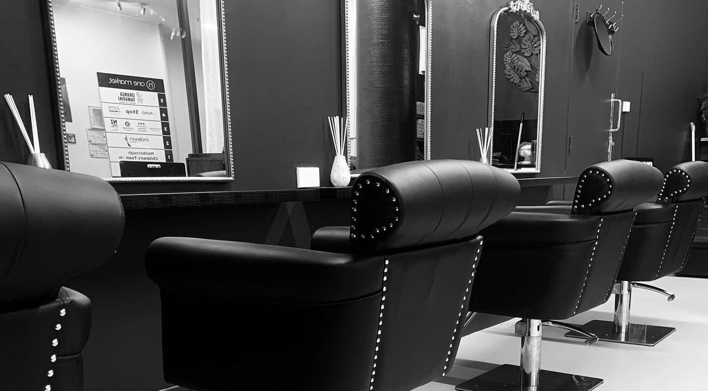 Elegant salon chairs at Luxe Hair Lounge, Blenheim, Marlborough, NZ offering a luxurious beauty experience.