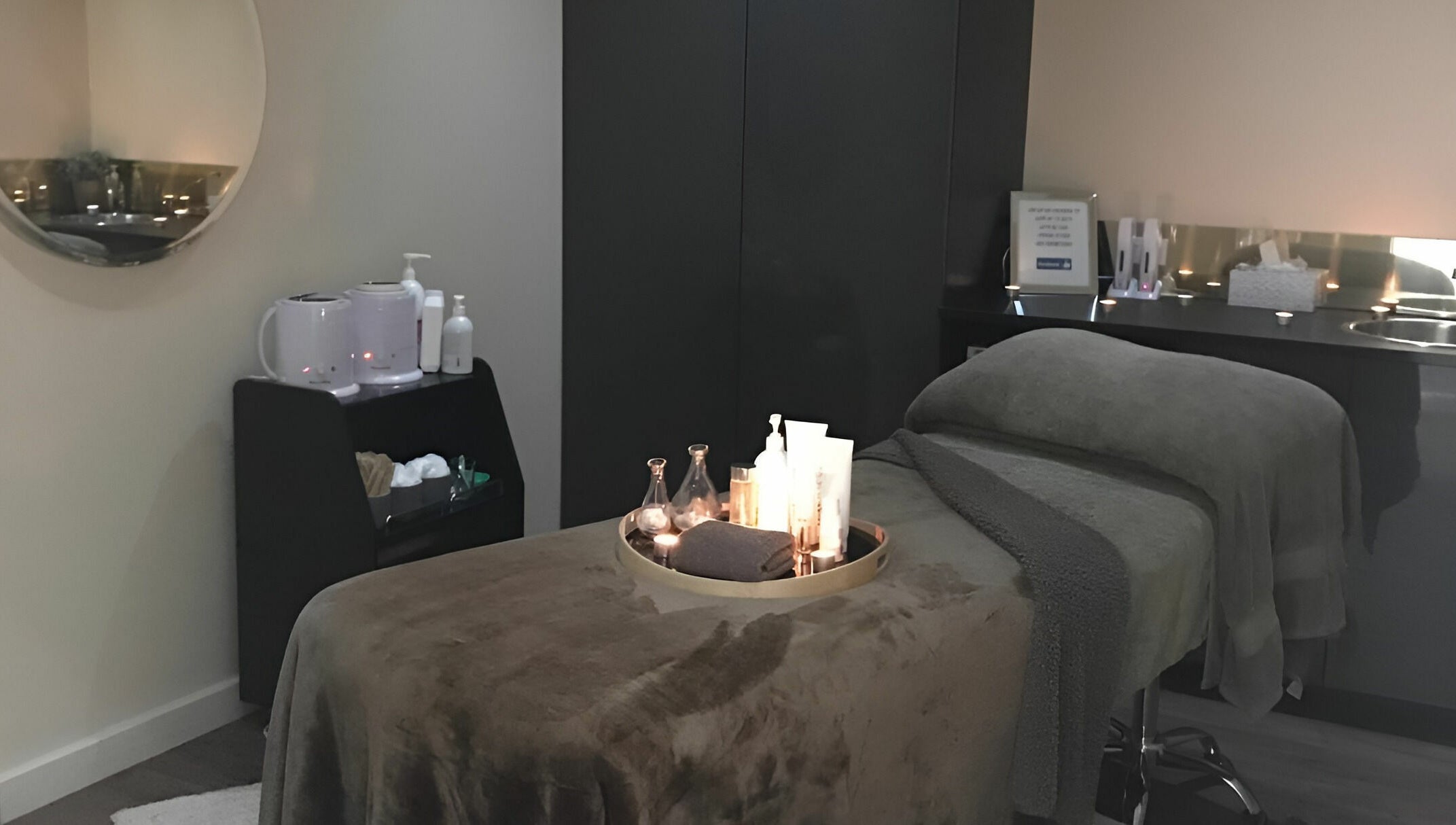Relaxing therapy room at The Haven Medi Spa, Halls Head, Western Australia, AU, with a cozy treatment table.