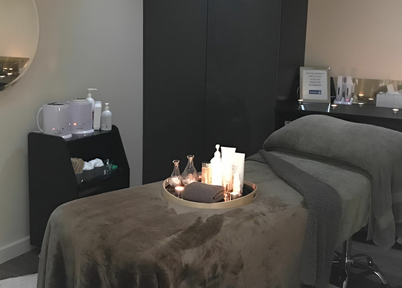 Relaxing therapy room at The Haven Medi Spa, Halls Head, Western Australia, AU, with a cozy treatment table.
