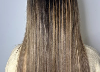 Stunning straight hair styled at Emily Louisa Hair in East Kilbride, Scotland, GB, showcasing expert hairdressing.