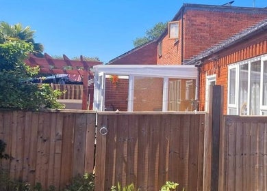 Pupa Beauty Body Treatments in Weeting, England, showcasing a cozy garden view with red brick exterior.