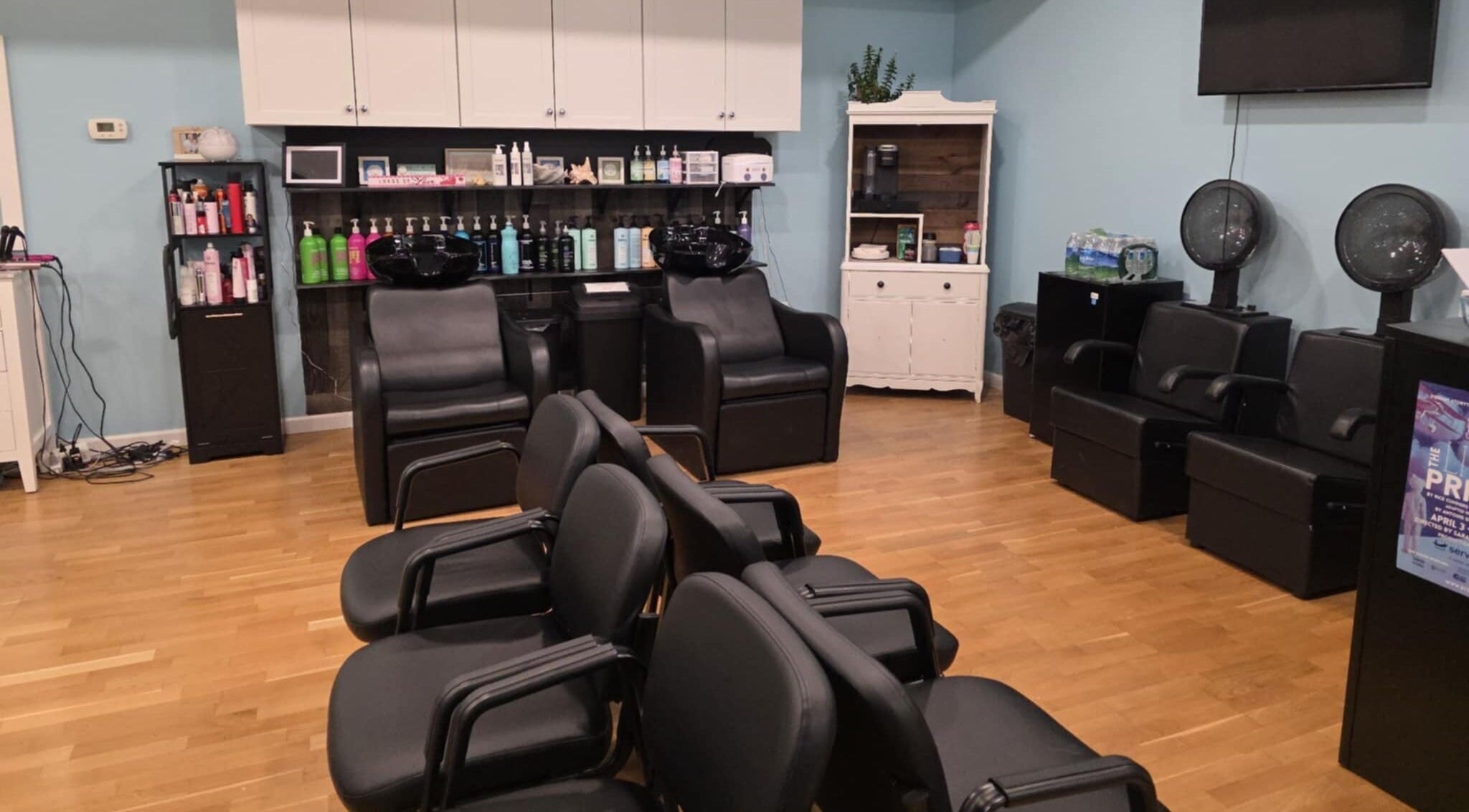 Modern seating and hair washing stations at The Breeze Hair Salon in Bloomsburg, Pennsylvania, US.