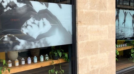 Window display at Beauty By Yasemin, Bristol, England, GB, showcasing heart design and wellness products.