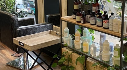 Beauty By Yasemin in Bristol, England showcases premium products neatly arranged on an elegant shelf.