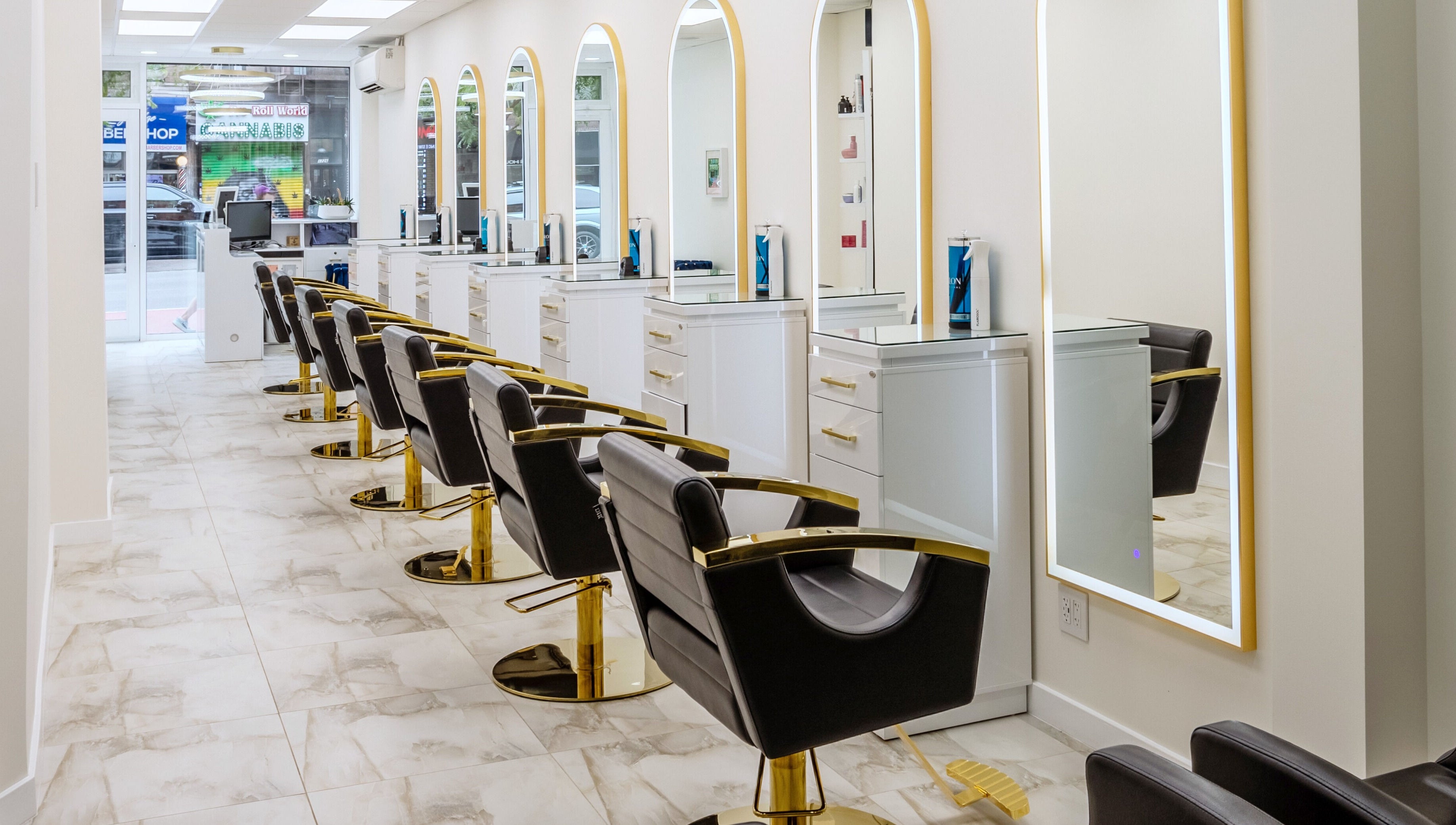 Elegant interior of Fabio's Hair and Color Studio featuring stylish chairs, New York, New York, US.