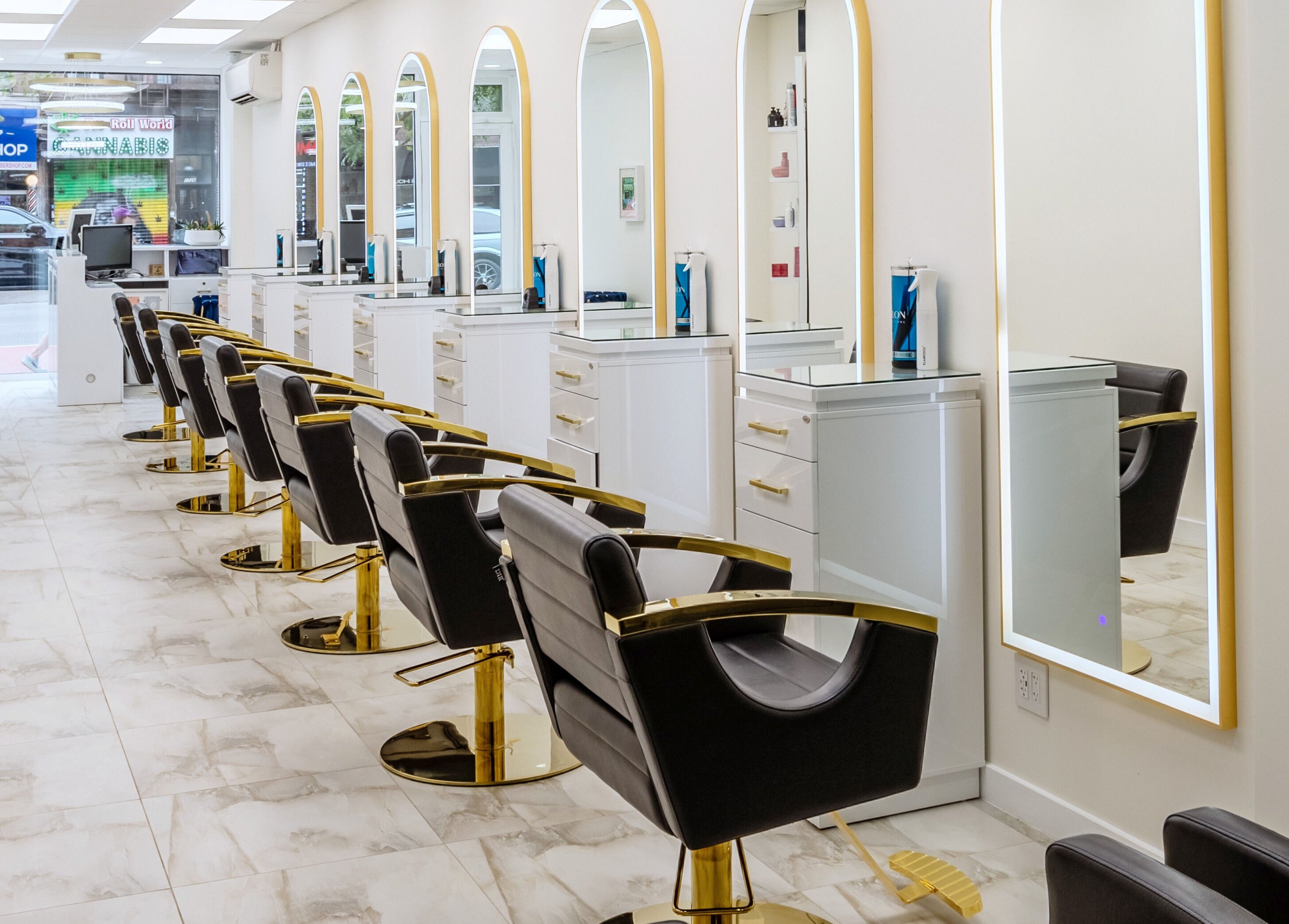 Elegant interior of Fabio's Hair and Color Studio featuring stylish chairs, New York, New York, US.