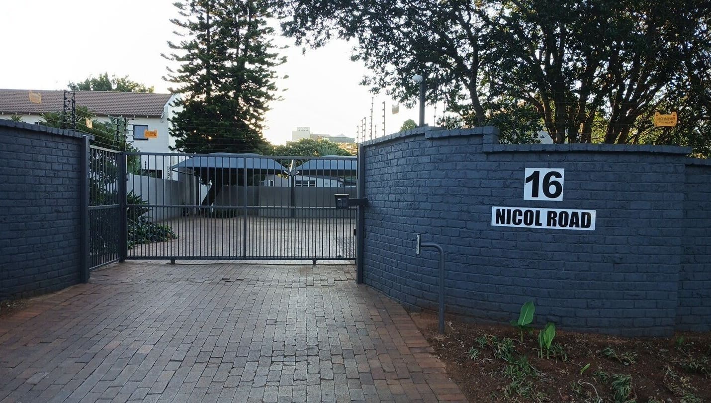 Gated entrance of SN BEAUTY LAB at 16 Nicol Road, Johannesburg, Gauteng, ZA.