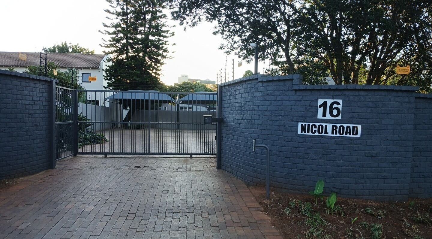 Gated entrance of SN BEAUTY LAB at 16 Nicol Road, Johannesburg, Gauteng, ZA.