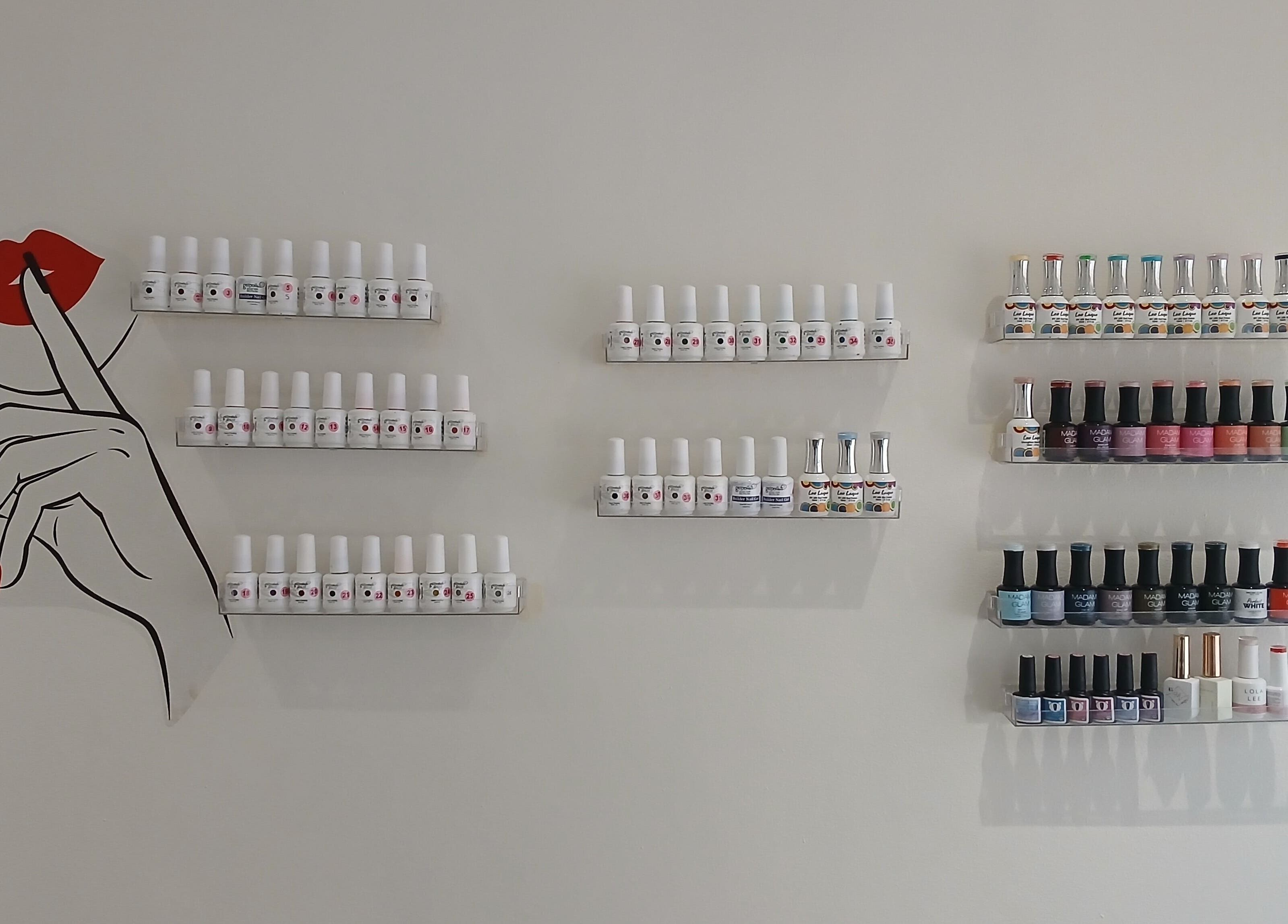 Nail polish display wall at SN BEAUTY LAB, Johannesburg, Gauteng, ZA showing diverse manicure colors.