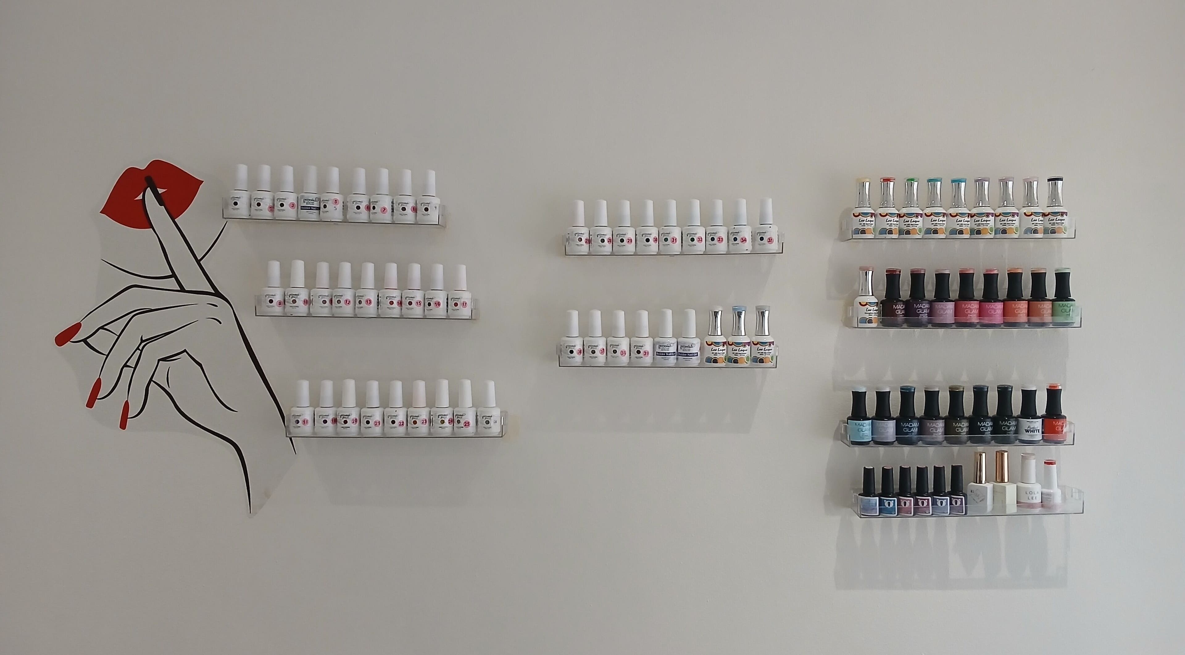 Nail polish display wall at SN BEAUTY LAB, Johannesburg, Gauteng, ZA showing diverse manicure colors.