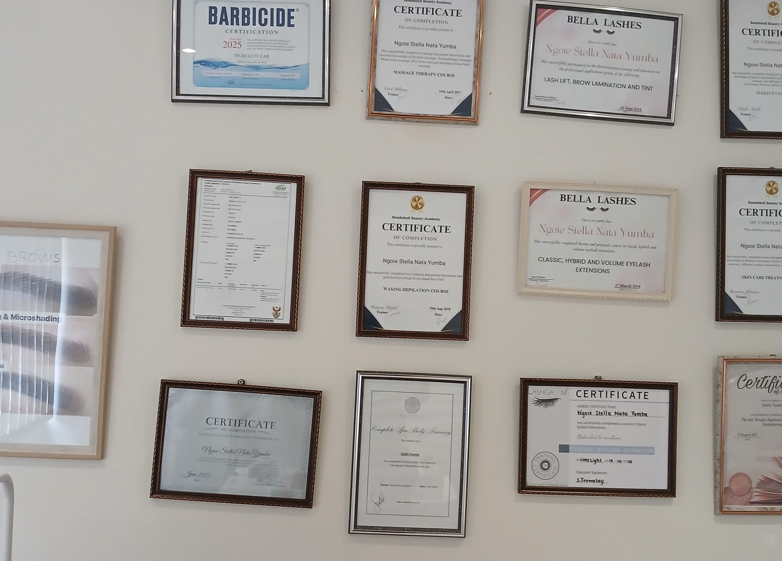 Certificates displayed at SN BEAUTY LAB, Johannesburg, Gauteng, ZA highlighting expertise in beauty services.