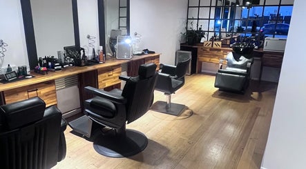 Modern barber chairs at Be The Man Barber, Melbourne, Victoria, AU, creating a stylish grooming space.