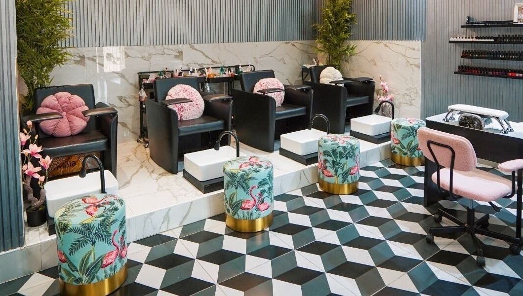 Vog Beauty Salon For Ladies in دبي, دبي, AE, featuring chic pedicure chairs with flamingo decor.