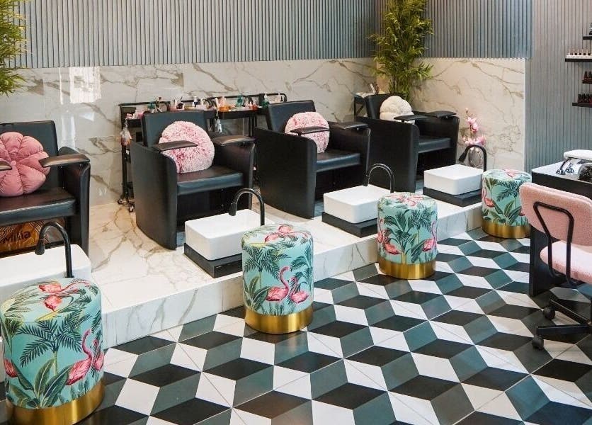 Vog Beauty Salon For Ladies in دبي, دبي, AE, featuring chic pedicure chairs with flamingo decor.